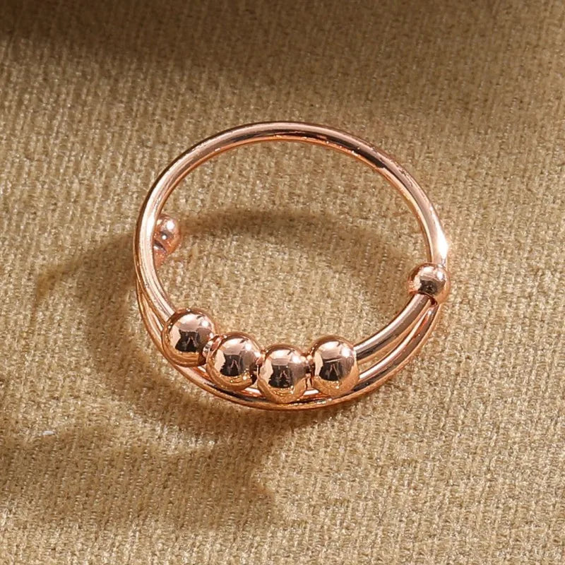 Four Round Beads - Rose Gold