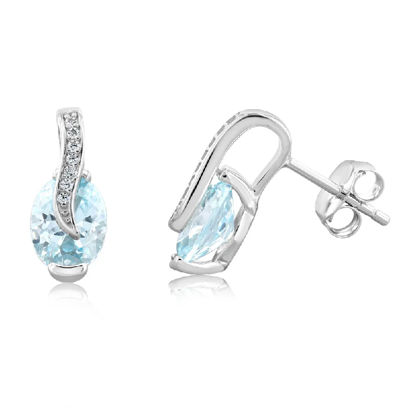 radiant gemstone drop earrings for women -Sterling Silver Rhodium Plated Light Blue And White CZ Crossover Stud Earrings