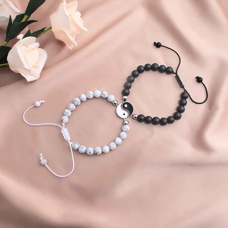 Taiji Black Frosted White Loose Knot Bracelet Pair