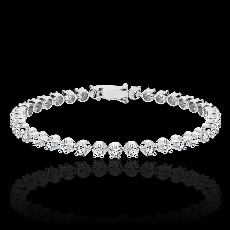 trendy gemstone bangle sets for women -A classical tennis bracelet embedded with round brilliant diamonds with a mirror setting for the ultimate brilliance certified by HRD Antwerp - IB89